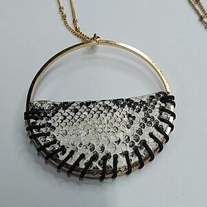 Snakeskin circle pendant on goldtone chain‎